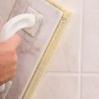 soften grout for removal