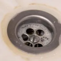 Soap and hot water to remove clogs from drain